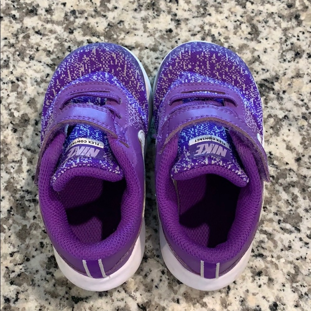 Purple Nike shoes. Size 7